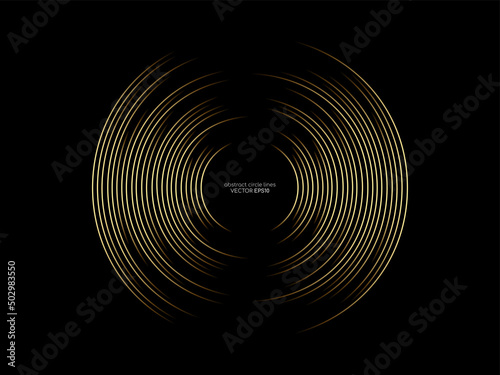 Abstract circle line pattern spin gold light isolated on black background in the concept of music  technology  digital