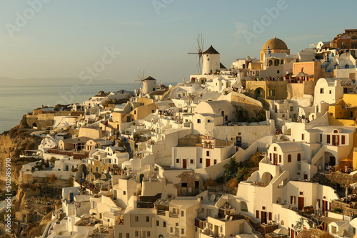 The whitewashed hillside buildings of the village Oia, Santorini, Greece