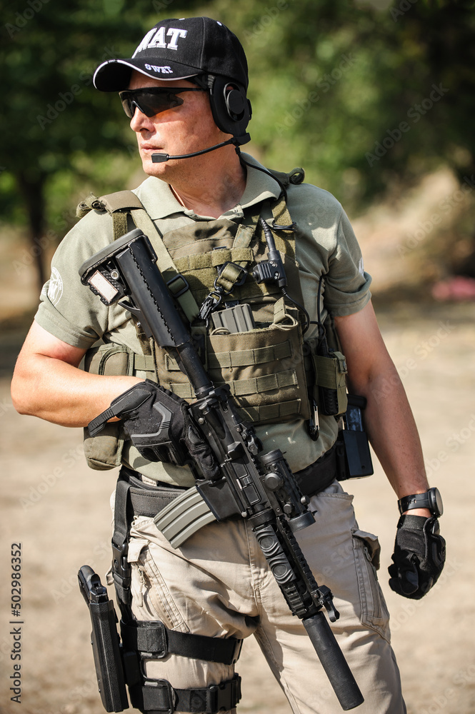 Full armed swat special forces army soldier in combat uniform