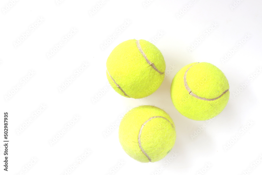Three tennis balls, Isolated green balls for sport tennis on white background, Sport concept
