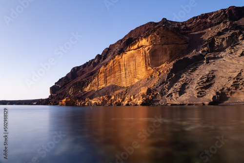 The Linosa volcano called Monte Nero in the beach of Cala Pozzolana di Ponente, Sicily