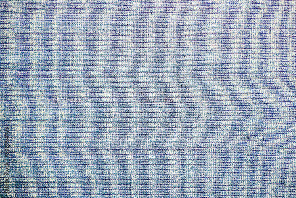 Fototapeta premium Surface made of coarse plastic textile fabric.