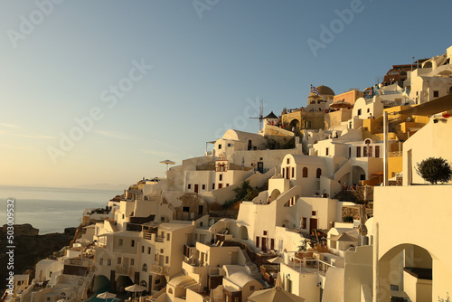 The whitewashed hillside buildings of the village Oia, Santorini, Greece