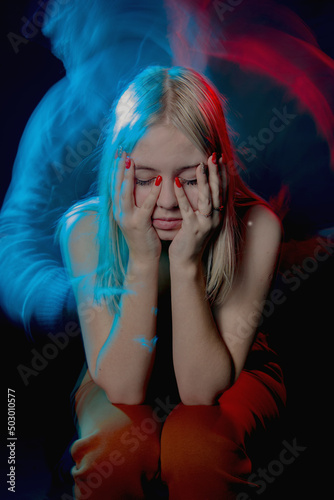 A thoughtful girl fantasizes. Multi-exposure.