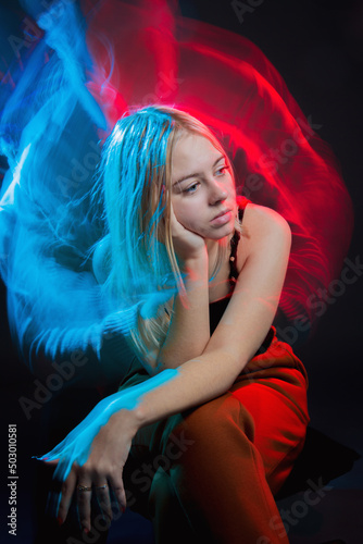 A thoughtful girl fantasizes. Multi-exposure.