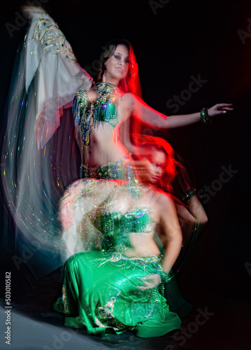 Young woman dancing belly dance