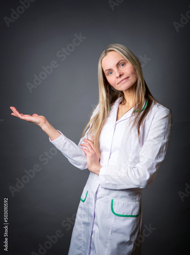 A competent woman in a white coat