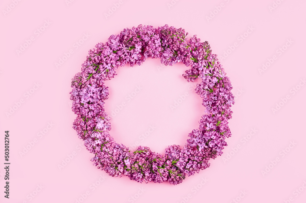 Lilac flowers wreath decoration, floral circle border with copy space