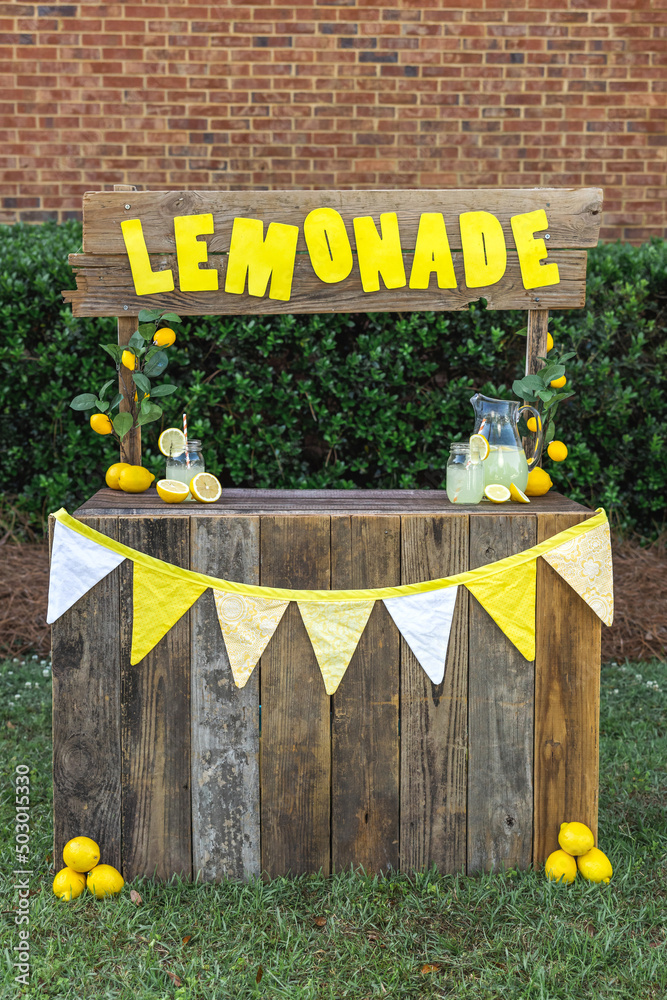 An empty lemonade stand ready for children to start selling lemonade on ...