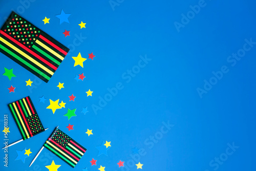 creative background for  Juneteenth African American Holiday Celebrating Freedom. Black Liberation African American flags and stars