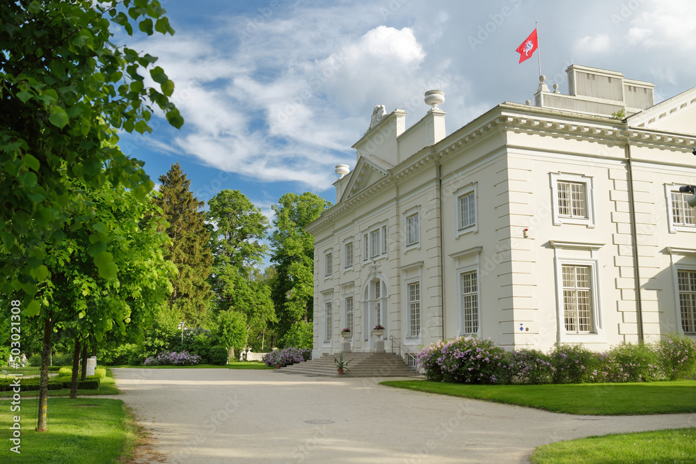 Fototapeta premium Uzutrakis Manor, residential manor of the Tyszkiewicz family in Uzutrakis, on the shore of Lake Galve, opposite the famous Trakai Castle.