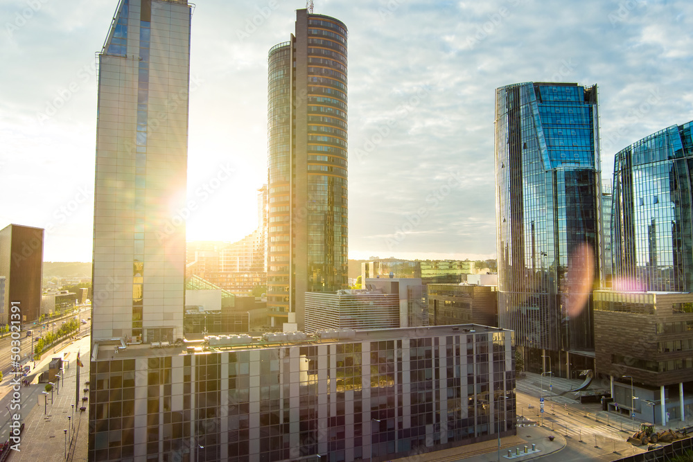 Beautiful aerial evening view of Vilnius business district with scenic sunset illumination.