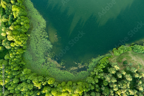 Beautiful top down aerial view of a lake in Moletai region, famous or its lakes.