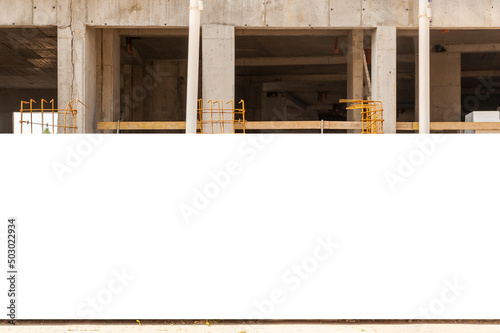 Blank white banner for advertisement mounted on the hoardin of construction site photo