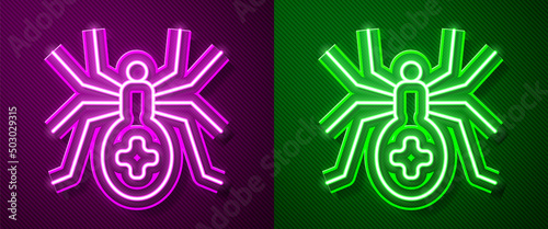 Glowing neon line Spider icon isolated on purple and green background. Happy Halloween party. Vector