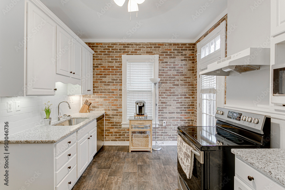 modern kitchen interior with kitchen brick white backsplash hardwood floors modern kitchen interior with kitchen brick white backsplash hardwood floors
