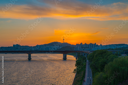 Along the Han River, Traffic and  Sunset skyline of Seoul City.  South Korea © mongkol