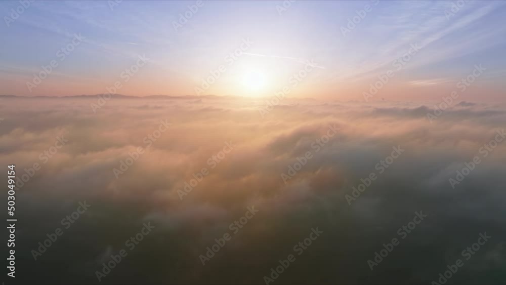 Blue sky with golden clouds. Puffy fluffy pink clouds. Drone flying above cumulus cloudscape. Summer blue sky sunrise. Nature weather blue sky background. Cinematic clouds, ecology nature 4K footage Blue sky with golden clouds. Puffy fluffy pink clouds. Drone flying above cumulus cloudscape. Summer blue sky sunrise. Nature weather blue sky background. Cinematic clouds, ecology nature 4K footage