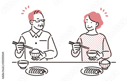 食事を楽しむシニア夫婦