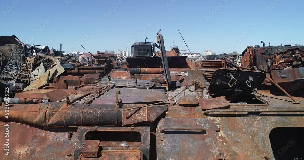 Burnt military equipment after a missile attack. Abandoned rusty military equipment. City of Irpin. Ukraine. War. Burnt military equipment after a missile attack. Abandoned rusty military equipment. City of Irpin. Ukraine. War.
