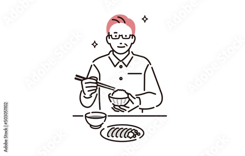 食事を楽しむシニア男性