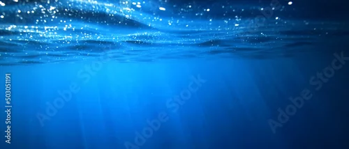 Panel kuchenny z motywem ocean underwater rays of light background, under blue water sunlight