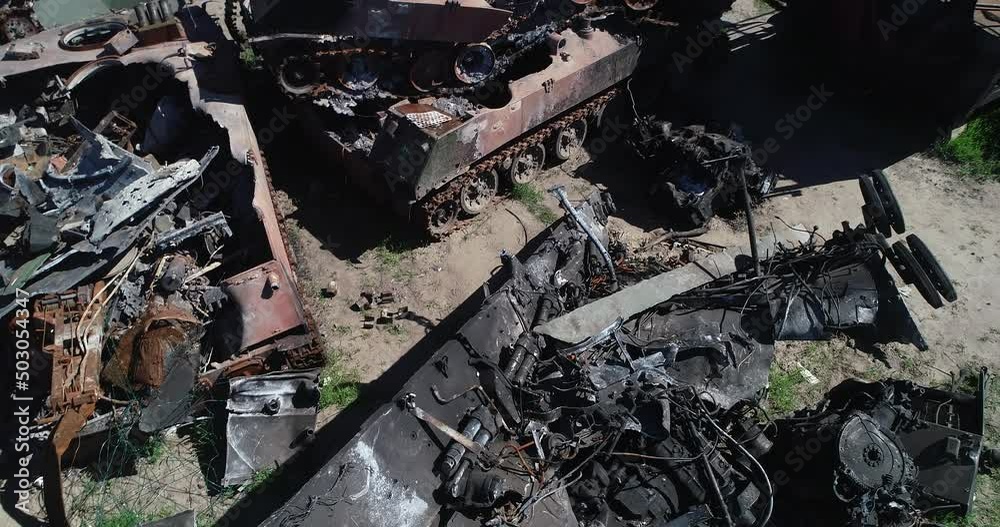 Burnt military equipment after a missile attack. Abandoned rusty military equipment. City of Irpin. Ukraine. War. Burnt military equipment after a missile attack. Abandoned rusty military equipment. City of Irpin. Ukraine. War.
