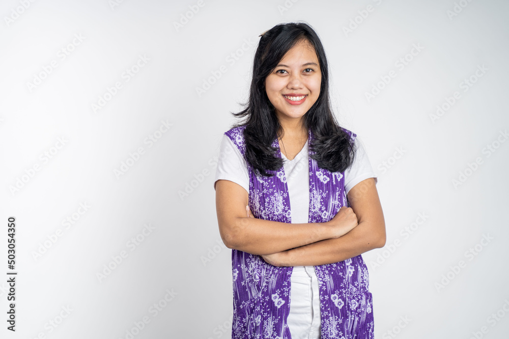 young beautiful ethnic asian woman stand with crossed hands on isolated background young beautiful ethnic asian woman stand with crossed hands on isolated background