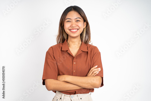 Wallpaper Mural young beautiful ethnic asian woman stand with crossed hands on isolated background Torontodigital.ca