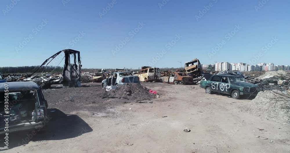 Technology cemetery. Abandoned cars of civilians during the evacuation of the city during the bombing of the city of Bucha. War in Ukraine. Aerial Technology cemetery. Abandoned cars of civilians during the evacuation of the city during the bombing of the city of Bucha. War in Ukraine. Aerial