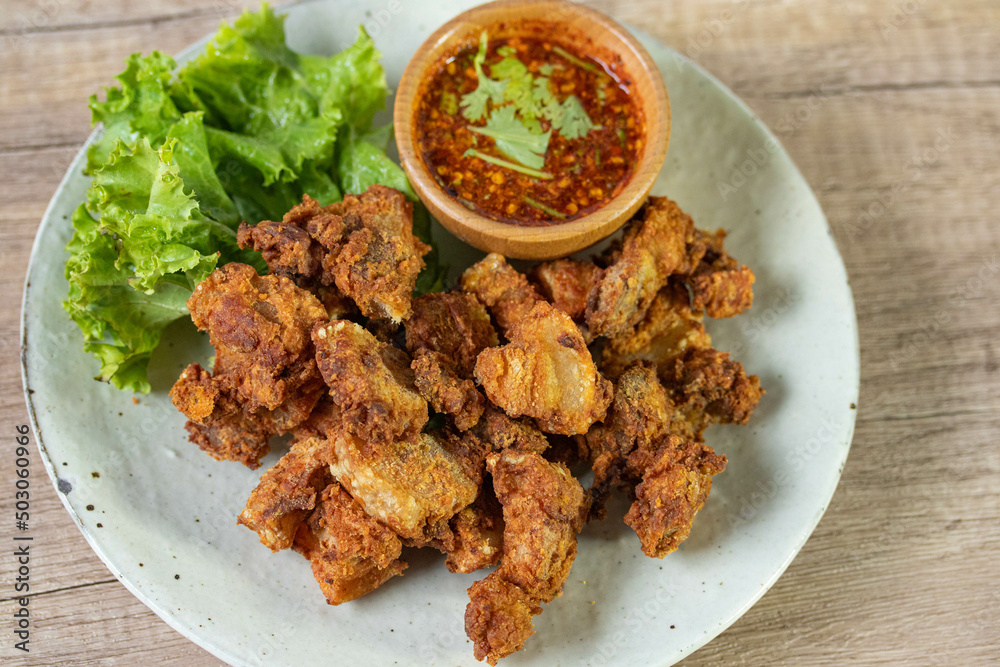 Fried pork with fish sauce and spicy jaew sauce Fried pork with fish sauce and spicy jaew sauce