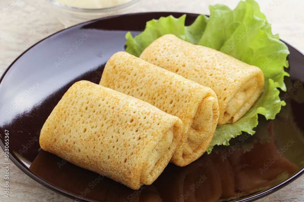 Stuffed pancakes with meat and cream Stuffed pancakes with meat and cream