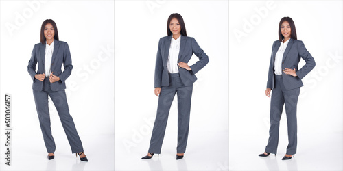 Full length Portrait of 20s Asian business Woman black short hair white shirt gray suit pant shoes