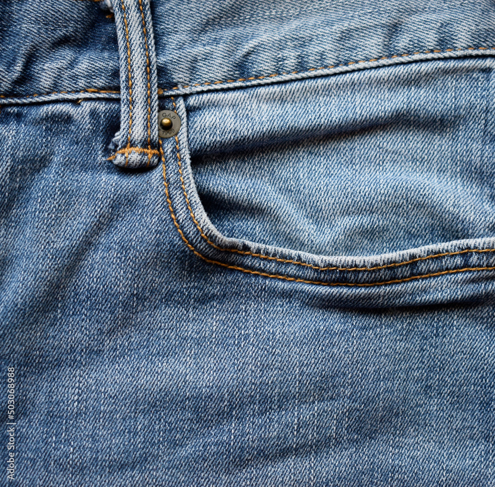 Texture of jeans, close-up. Blue jeans, denim background. Texture of jeans, close-up. Blue jeans, denim background.