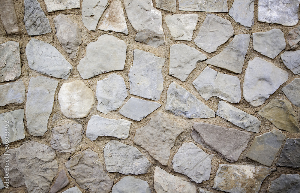 Obraz premium Wall decorated with stone