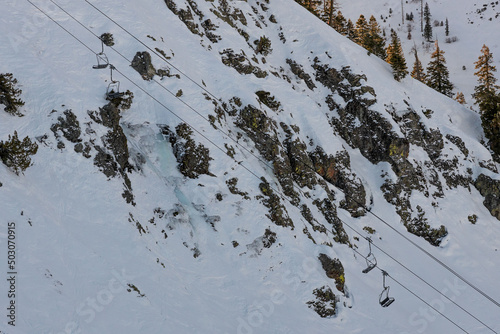 Aerial shot of the chairlifts at a ski resort in Sierra Nevada Mountains, California, United States