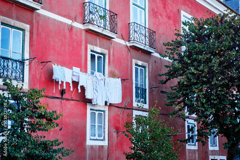Travel by Lisbon. Ancient architecture of old town. Drying clothes. Travel by Lisbon. Ancient architecture of old town. Drying clothes.