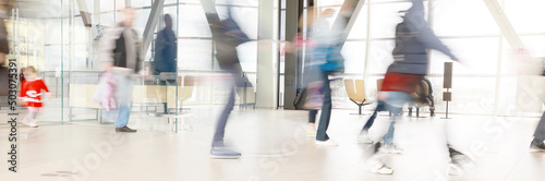 blurred background people movement office