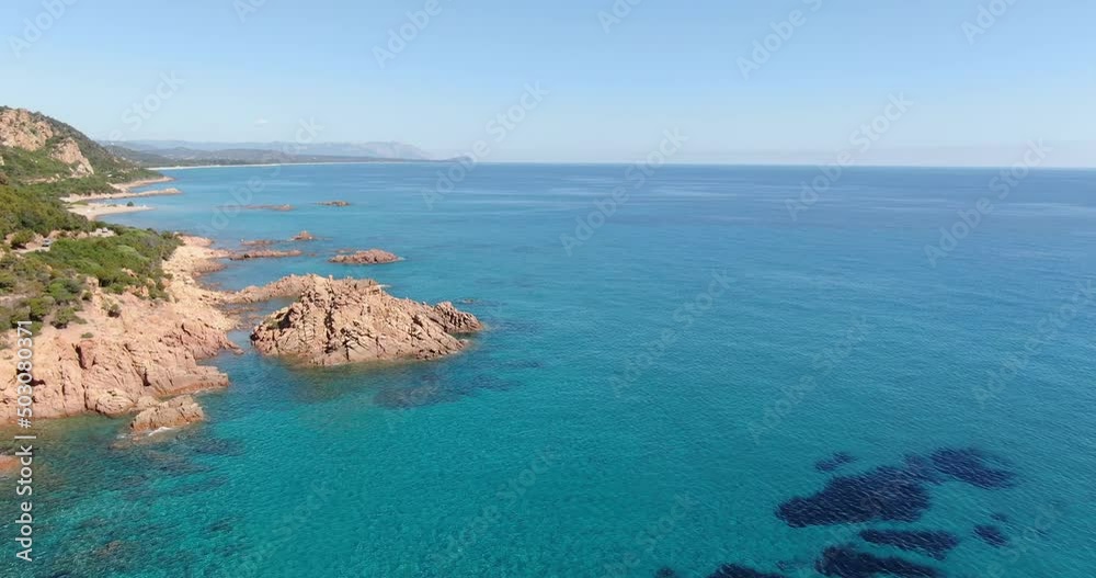 Sardinia, Italy. Aerial drone view. Flight slowly turning to show the coast and view of the beach. Sardinia, Italy. Aerial drone view. Flight slowly turning to show the coast and view of the beach.