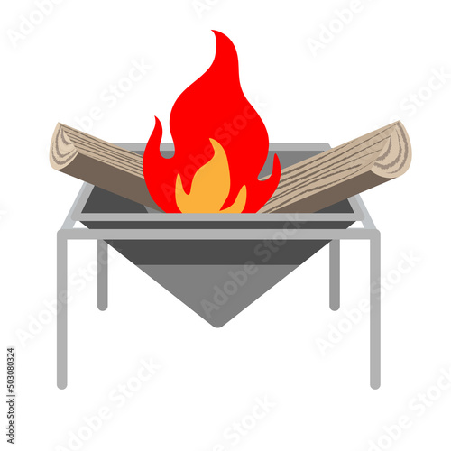 Flaming firewood in the bonfire stand