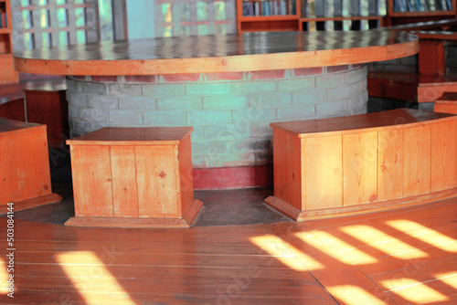 Concrete table with creative wood seat in a library at Zinda Park  Bangladesh. Interior decoration of a library.