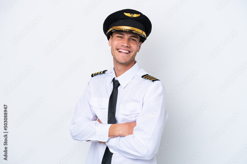 Airplane caucasian pilot isolated on white background with arms crossed and looking forward Airplane caucasian pilot isolated on white background with arms crossed and looking forward