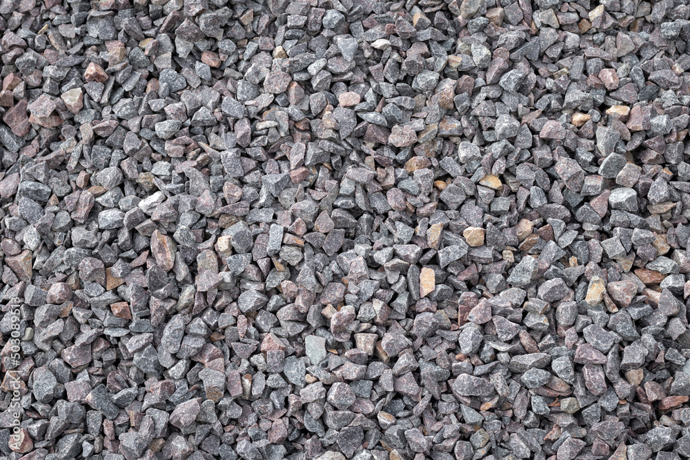Crushed rock close up. Stone road building material gravel texture, background. Crushed rock close up. Stone road building material gravel texture, background.