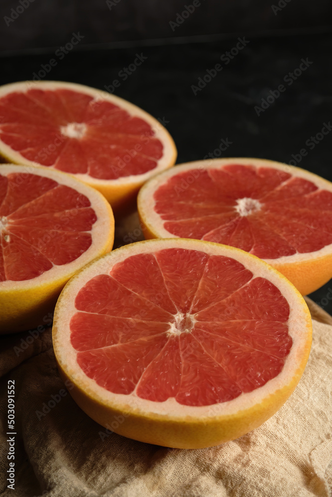 sliced ripe grapefruit on a light cloth sliced ripe grapefruit on a light cloth