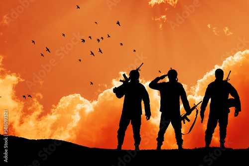 Silhouettes of soldiers against the sunrise. Concept - protection, patriotism, honor. Armed forces of Turkey, Israel, Egypt and other countries.