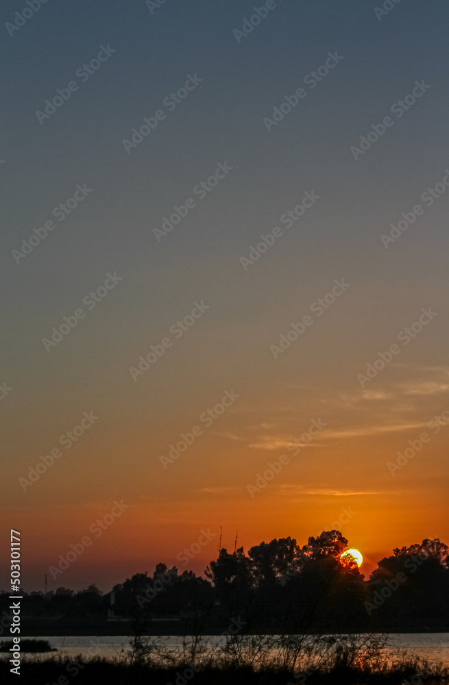 Obraz premium incredible sunset over the river