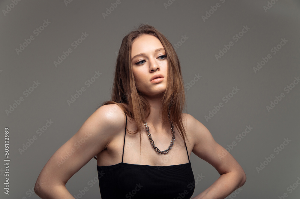 Fototapeta premium Need to think. Serious young woman while being deep in thoughts about her problems and family quarrels