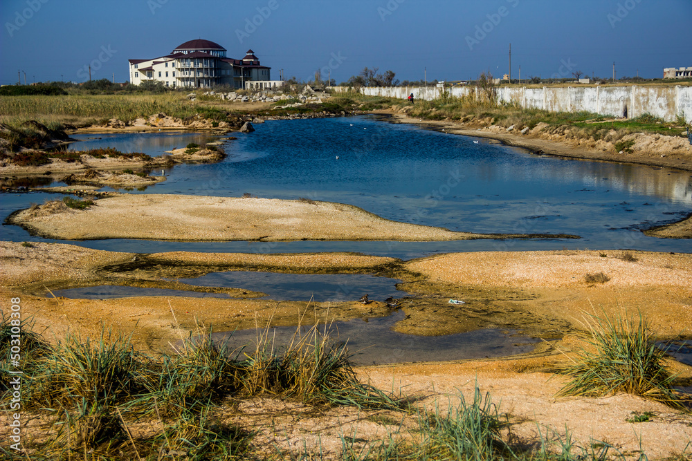 a shallow salty lagoon near the Azov sea on the Arabat Spit, Ukraine