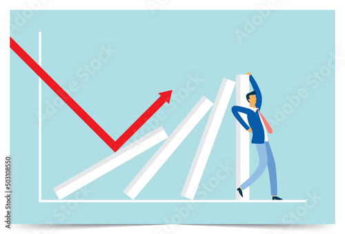 Businessman stopping domino effect