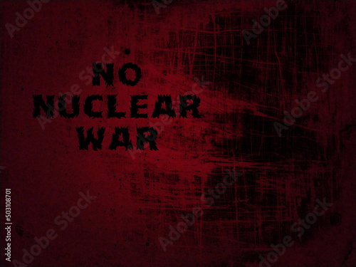 No nuclear war. War lettering in black. Red - black background. A call to peace. Abstract background picture. photo